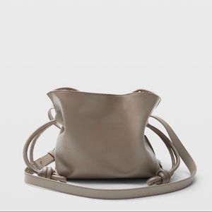 Club Monaco Cinch Crossbody Bag in Taupe.